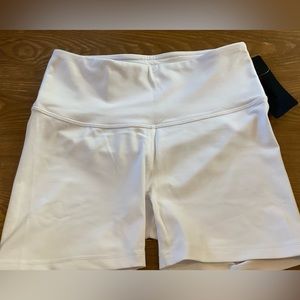 ODODOS Women's Tummy Control Yoga Shorts with Hidden Pockets and 4.5" Inseam